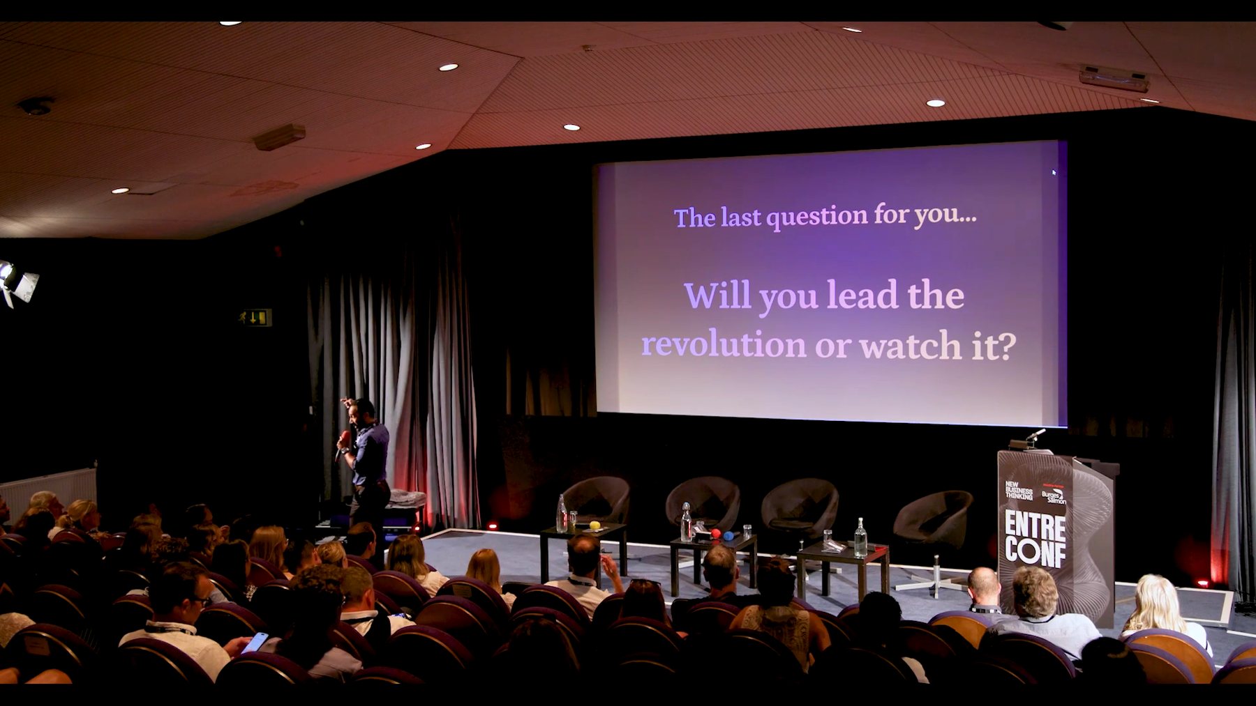 Dr Bruno Oliveira on stage, Applied AI for Business Leaders promotional reel